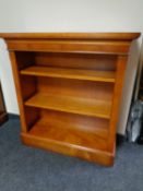 A set of Bradley Furniture reproduction yew wood open bookshelves