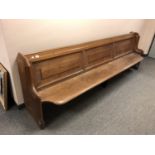 A 19th century oak church pew,