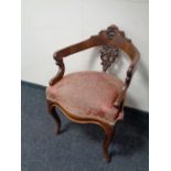 A 19th century mahogany elbow chair on cabriole legs