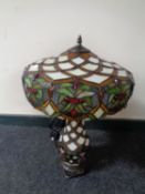 A Tiffany style leaded glass table lamp with shade