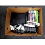 A box containing an X Box 360, leads,