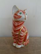 A Royal Crown Derby seated cat paperweight with gold stopper