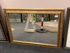 A gilt framed mirror,