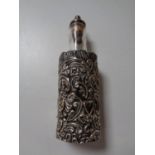 An antique glass and filigree silver scent bottle