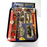 A tray containing five die cast car sets to include London's Fire Engine,