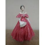 A Royal Worcester figure of Queen Elizabeth, The Queen Mother,