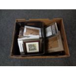 A box containing a quantity of new picture frames