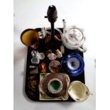 A tray of miscellany to include antique copper lamp base, Bakelite silver rimmed beaker,