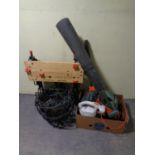 A box of Black & Decker Stihl electric leaf blowers and parts,