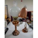 A copper and brass oil lamp with chimney and shade (converted),