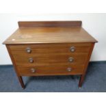 An Edwardian inlaid mahogany three drawer chest