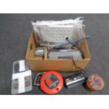 A box containing toolbox and tools, extension lead, folding step, torque wrench,