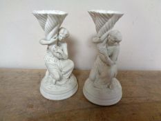 A pair of Parian figural vases, height 25.