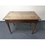 An Edwardian oak draftsman's table