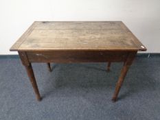 An Edwardian oak draftsman's table