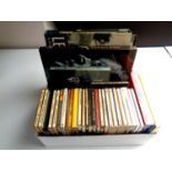 A box of a large quantity of CD's and books relating to The Beatles