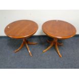 A pair of Bradley Furniture reproduction yew wood pedestal wine tables