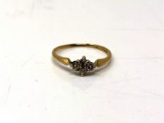 A 9ct gold four stone diamond ring,