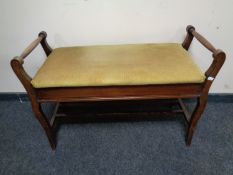 An Edwardian duet storage piano stool