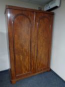 A Victorian mahogany double door wardrobe