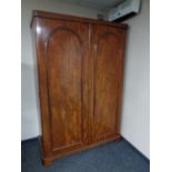 A Victorian mahogany double door wardrobe