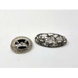 Two silver brooches