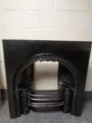 A 19th century cast iron Coalbrookdale fire insert