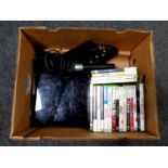 A box containing an X Box 360, leads,