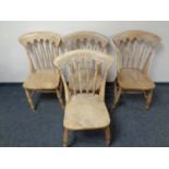 A set of four pine kitchen chairs