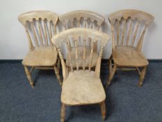 A set of four pine kitchen chairs