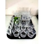 A tray of a quantity of assorted drinking glasses to include a set of six Edinburgh crystal whisky
