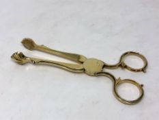 A good pair of early George III silver gilt sugar scissor nips, circa 1775, Hennell,