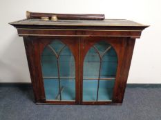 A 19th century mahogany double door bookcase top with pillar supports