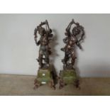A pair of antique French spelter figures of cherubs on green marble bases, Printemps et Automne,