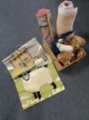 A box of woollen wall hanging depicting sheep, two rugs, cushion,