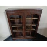 A Cameo Furniture mahogany double door bookcase