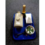 A tray of stoneware hot water bottle, plated cigarette case, marbles, silver badge,