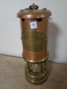 A copper and brass British Coal Mining lamp