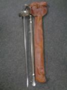 A First World War 1912 pattern cavalry sword in scabbard with outer leather cover