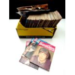 A box of a large quantity of 1980's Beatles Monthly books together with a quantity of unframed