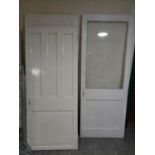 Two 20th century painted pine panel doors together with a further pine painted door with a glass