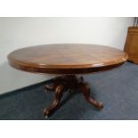 A Victorian oval pedestal breakfast table