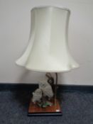 A Guiseppe Armani figural table lamp with shade,