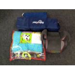 A Baby Dan travel cot together with a booster seat,