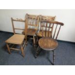 A pine dining table, a pair of beech kitchen chairs,