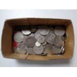 A box of assorted coins to include commemorative crowns, six pences,