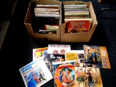 Two boxes containing LPs and LP box sets to include musicals, Singing in the Rain, Mary Poppins,