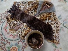 A box containing faux fur leopard print coat together with an Edna Wallace fur hat and a fur scarf