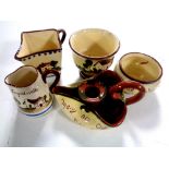 Five pieces of Torquay ware pottery