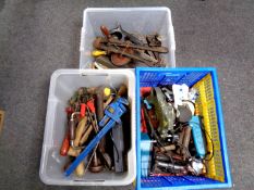 Three plastic crates containing a large quantity of assorted hand tools, bolt cutters,